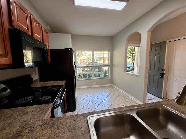 a room with furniture and a window