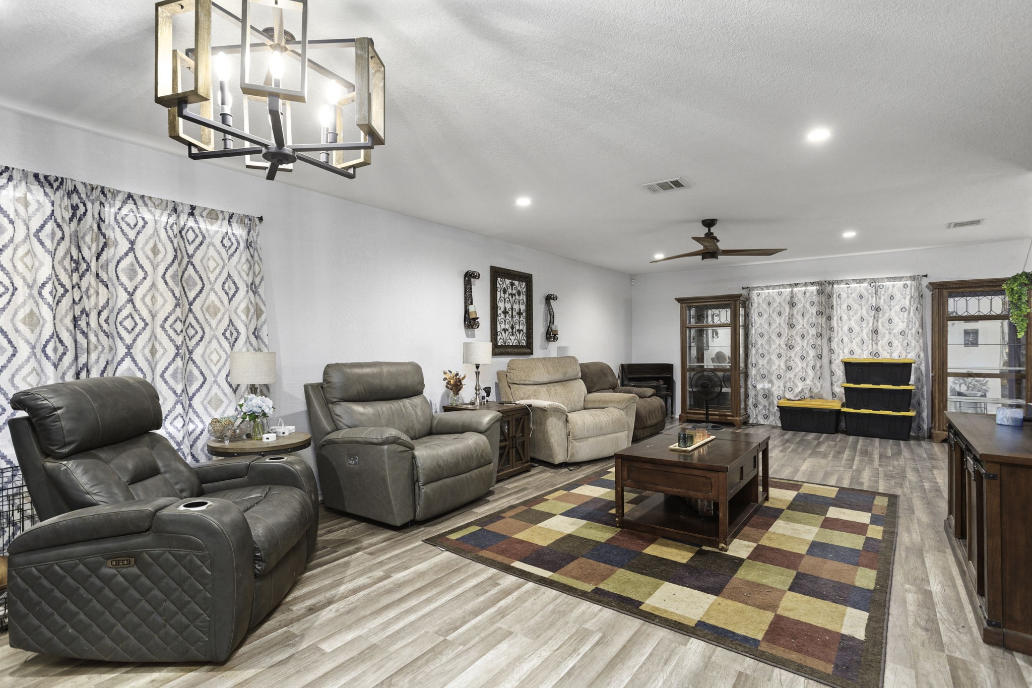 4518 Rothberger Way San Antonio, TX 78244 - Photo 4 of 18 a living room with furniture or couch and a chandelier
