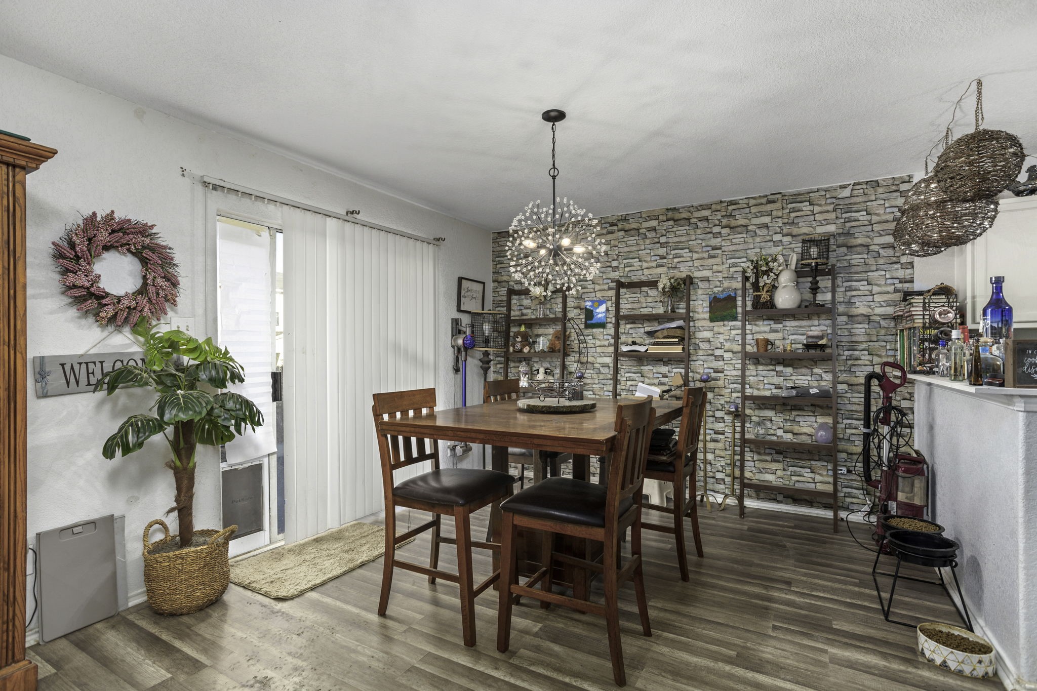 4518 Rothberger Way San Antonio, TX 78244 - Photo 7 of 18 a view of a dining room with furniture and wooden floor