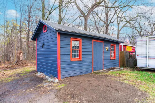 a view of a house with a small garden