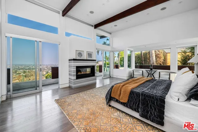 a spacious bathroom with a double vanity sink and a mirror