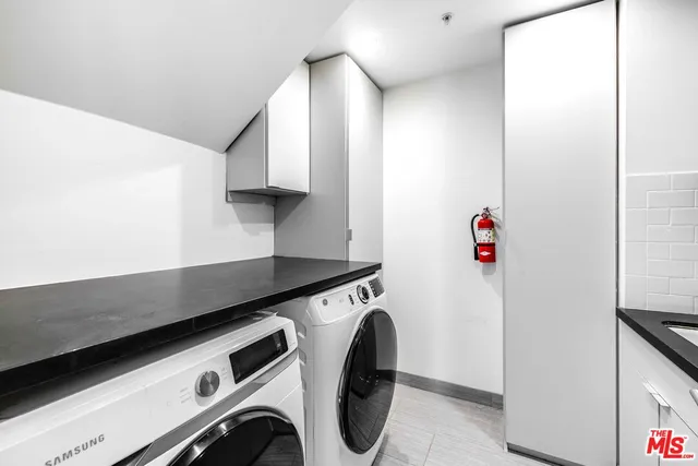 a outdoor living space with furniture and city view