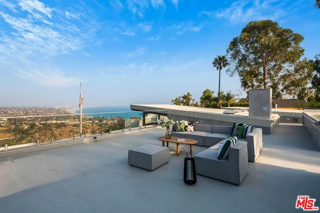 a view of a house with a street