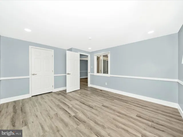 a view of a patio with couches and potted plants