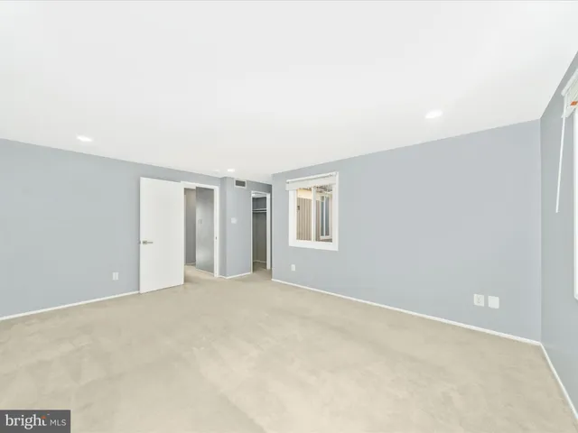 a view of swimming pool with outdoor seating