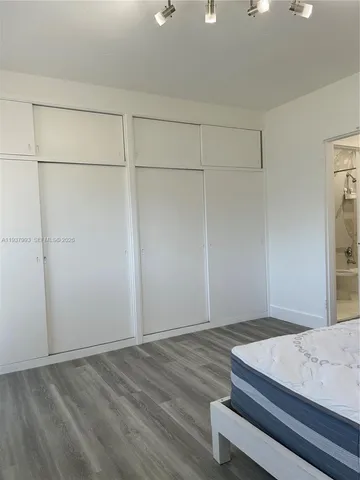 a swimming pool with outdoor seating and yard