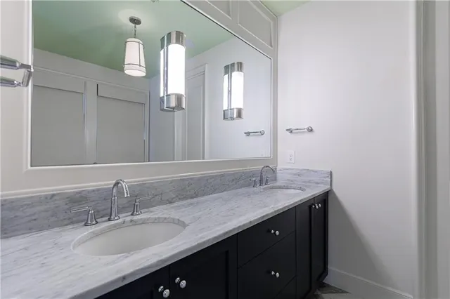 a white bath tub sitting in a bathroom
