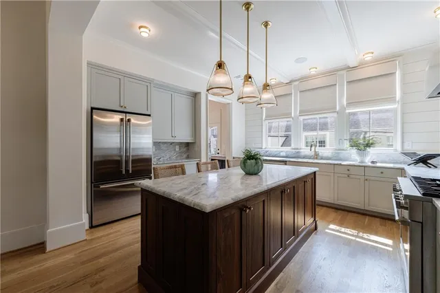 a kitchen with a sink and stove