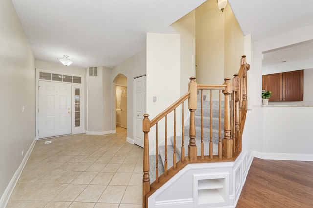 522 Telluride Court Bartlett, IL 60103 - Photo 2 of 18 a view of entryway with wooden floor