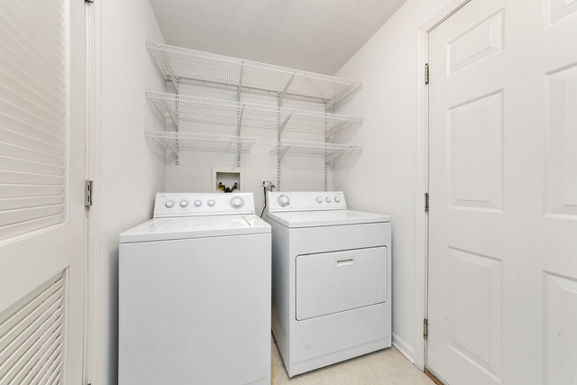522 Telluride Court Bartlett, IL 60103 - Photo 11 of 18 a utility room with dryer and washer