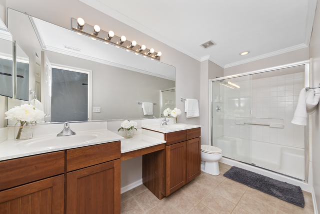 522 Telluride Court Bartlett, IL 60103 - Photo 14 of 18 a bathroom with a sink double vanity and a mirror