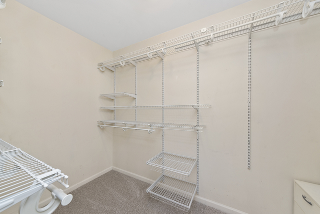 522 Telluride Court Bartlett, IL 60103 - Photo 15 of 18 a view of a room with racks on the wall