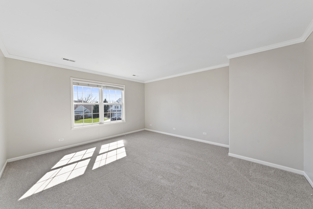 522 Telluride Court Bartlett, IL 60103 - Photo 16 of 18 an empty room with windows