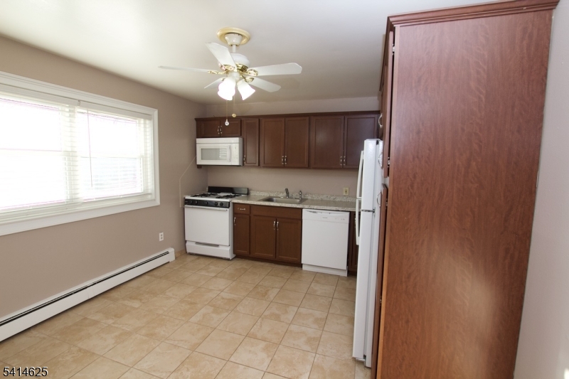 1 Wilson Road Sussex, NJ 07461 - Photo 8 of 12 a kitchen with stainless steel appliances granite countertop a refrigerator and a sink