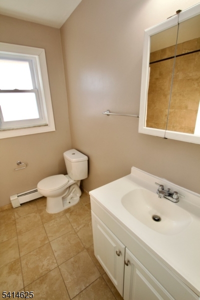1 Wilson Road Sussex, NJ 07461 - Photo 10 of 12 a bathroom with a sink mirror and toilet
