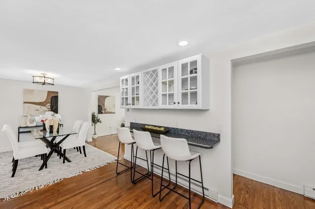 a view of a livingroom with furniture and wooden floor
