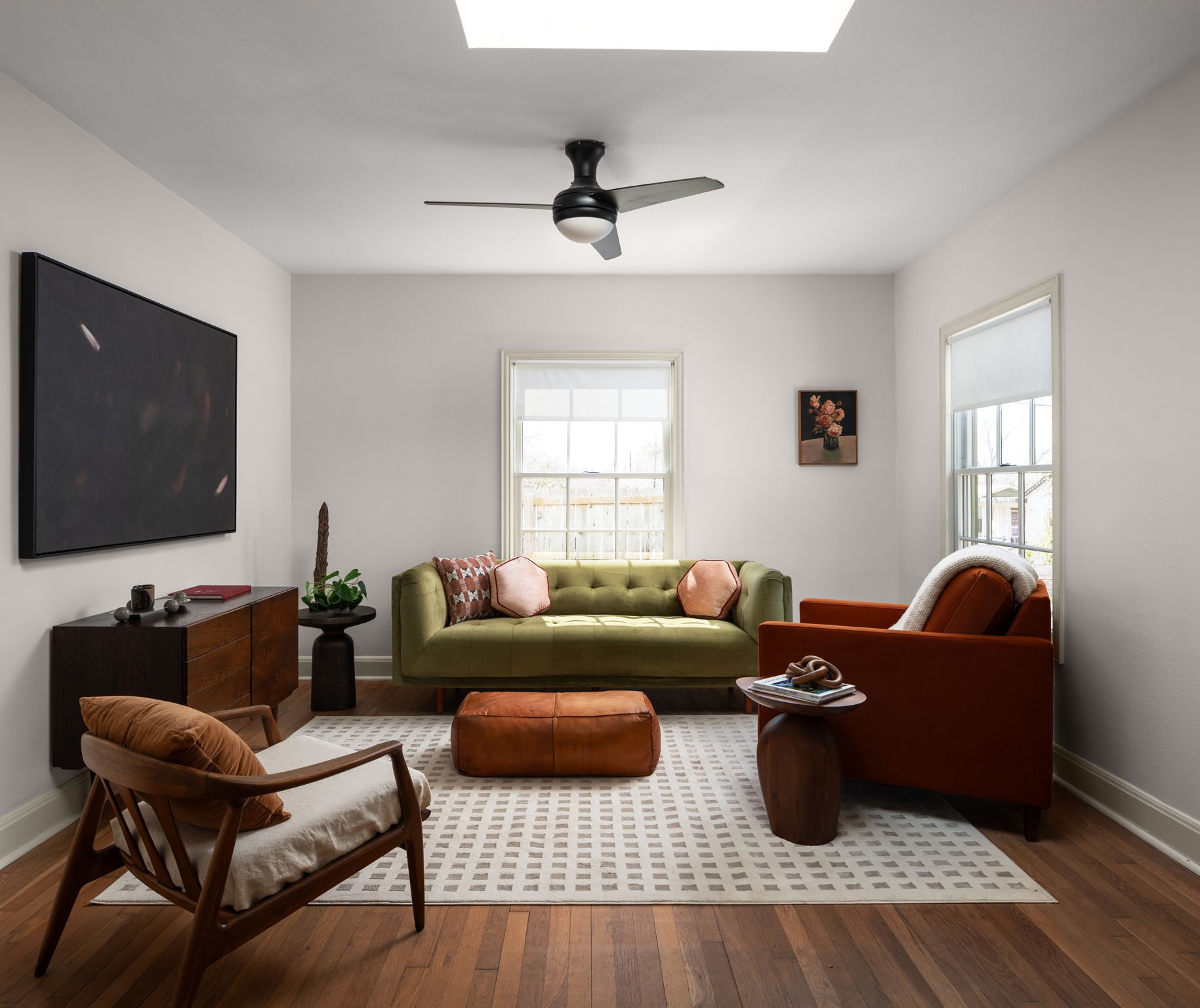 5101 Avenue F Austin, TX 78751 - Photo 1 of 1 a living room with furniture and a flat screen tv