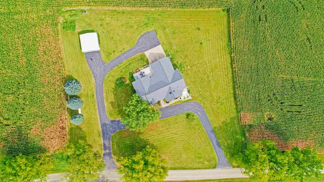 a view of a swimming pool with an outdoor space and seating area