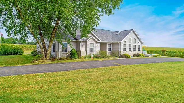 a view of a swimming pool with a yard