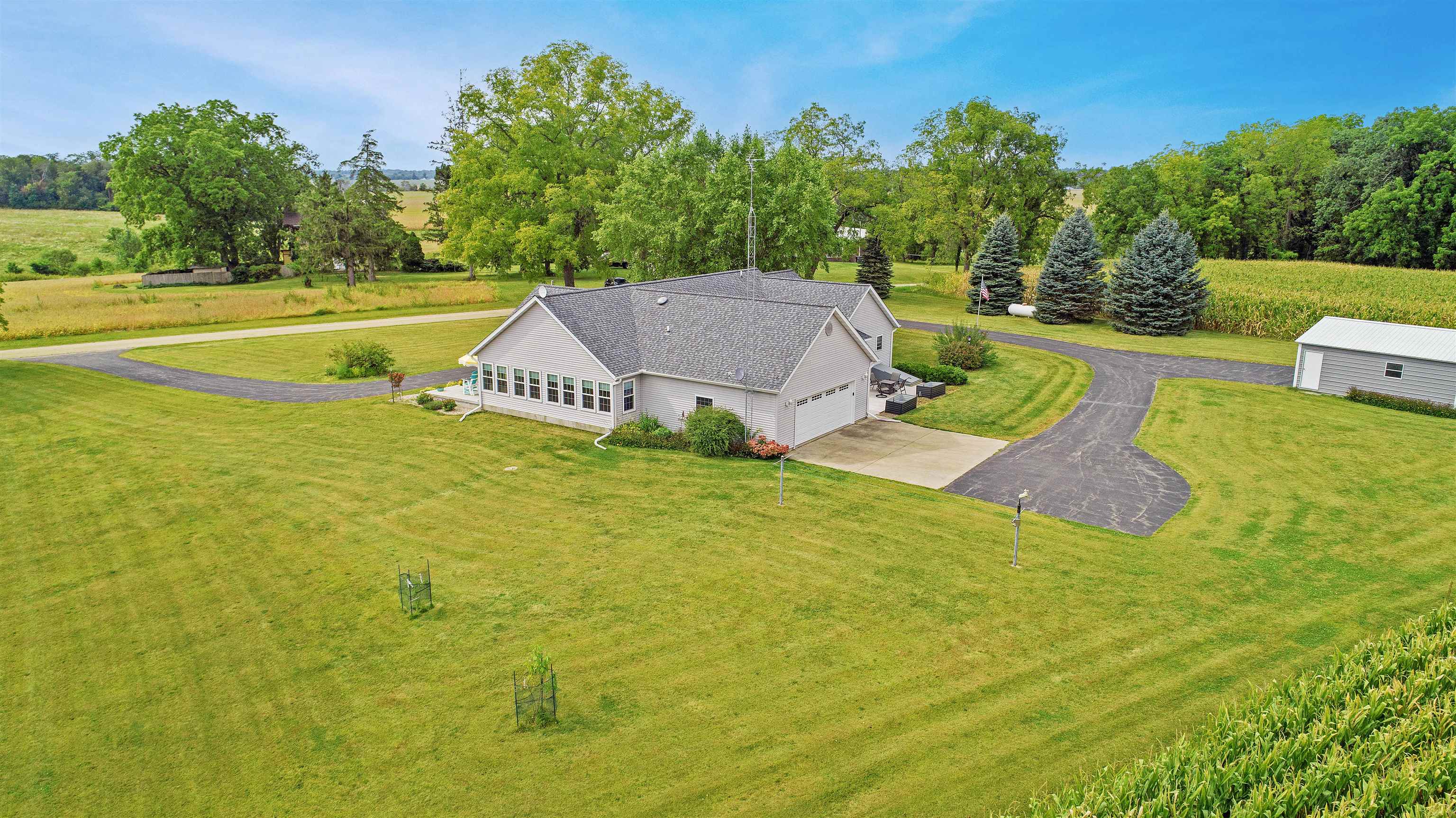 7821 Oakville Road Mount Carroll, IL 61053 - Photo 45 of 50 a view of an outdoor space and swimming pool