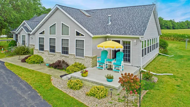 a view of a swimming pool with a lake view