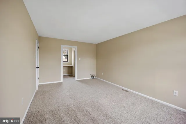 a view of an empty room and window