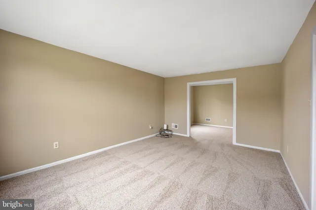 an empty room with a natural light