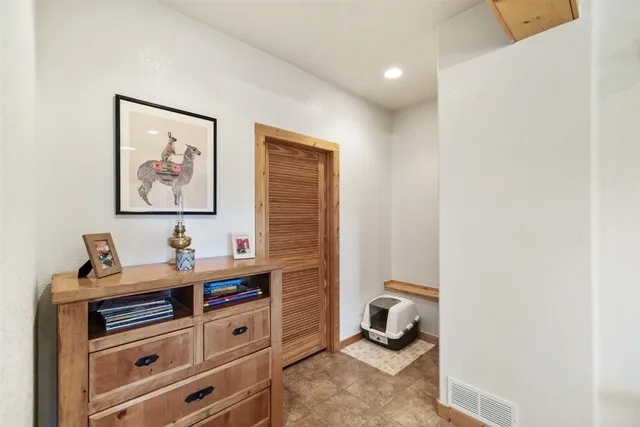 a view of a workspace with furniture