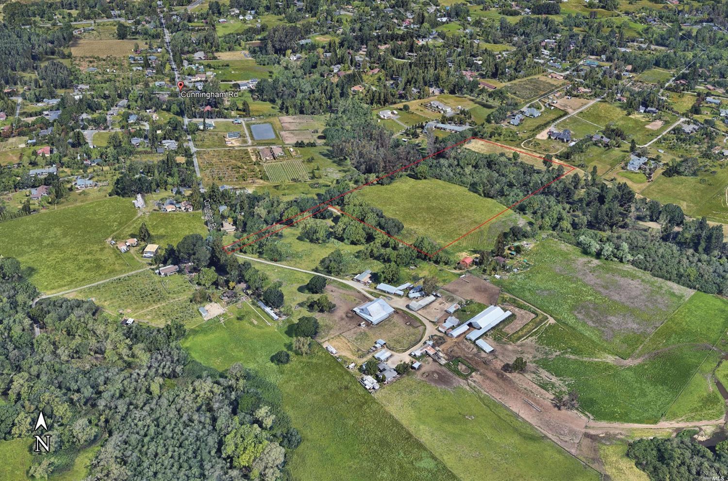 0 Cunningham Road Sebastopol, CA 95472 - Photo 1 of 1 an aerial view of residential houses with outdoor space and trees