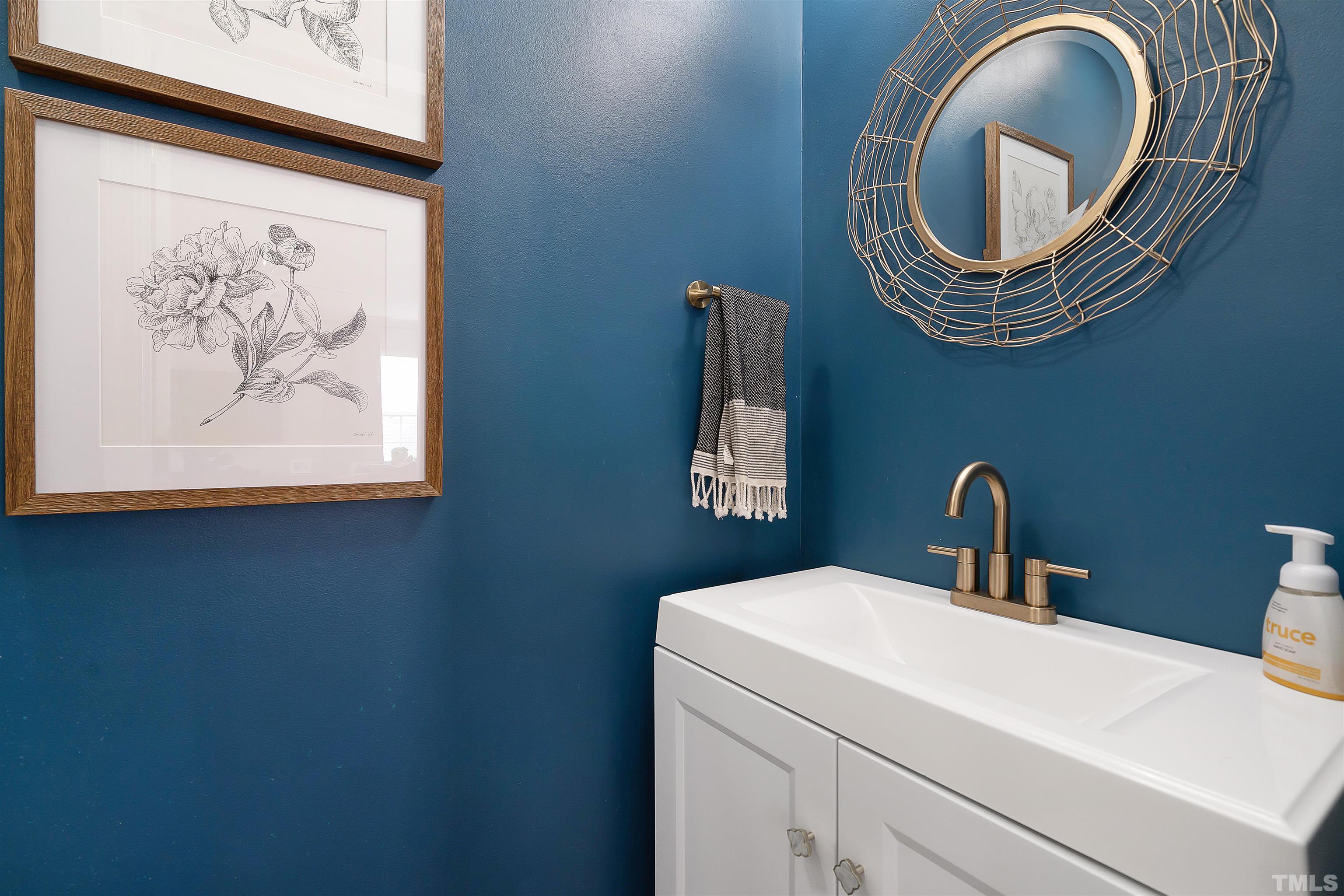 12440 North Exeter Way Durham, NC 27703 - Photo 18 of 36 a bathroom with a toilet and a sink