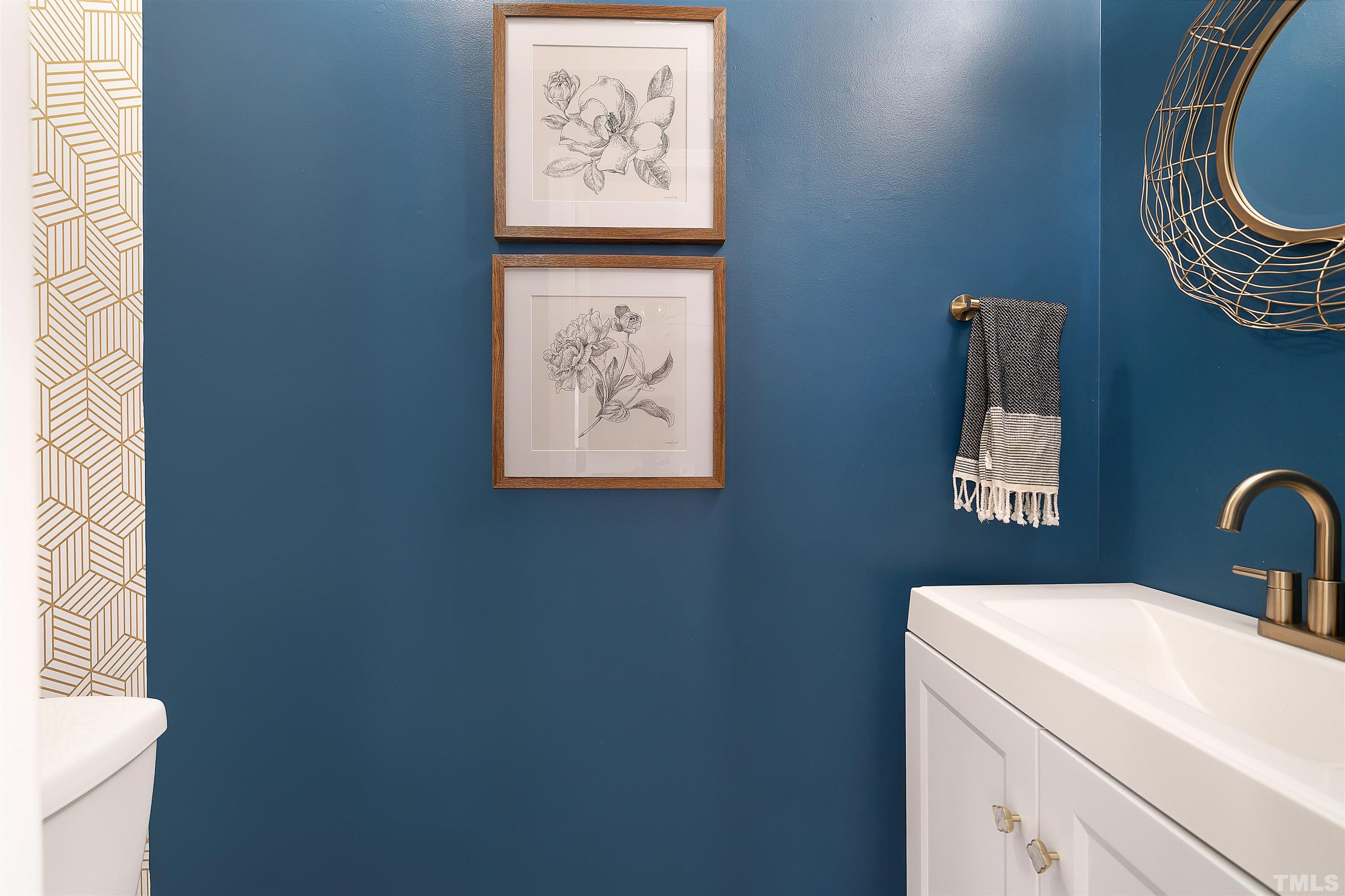 12440 North Exeter Way Durham, NC 27703 - Photo 19 of 36 a bathroom with a toilet and a sink