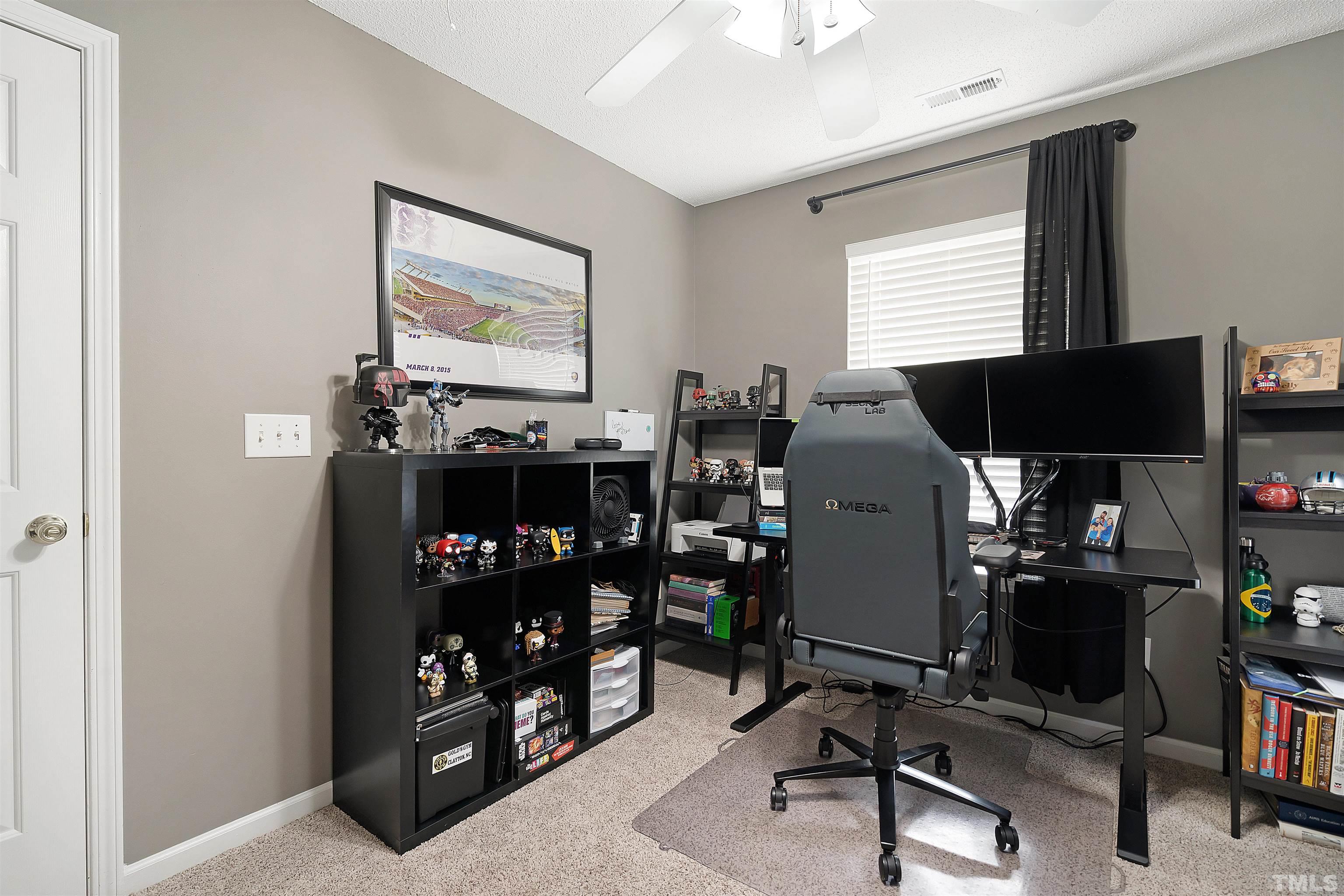 12440 North Exeter Way Durham, NC 27703 - Photo 28 of 36 a room with workspace and a window