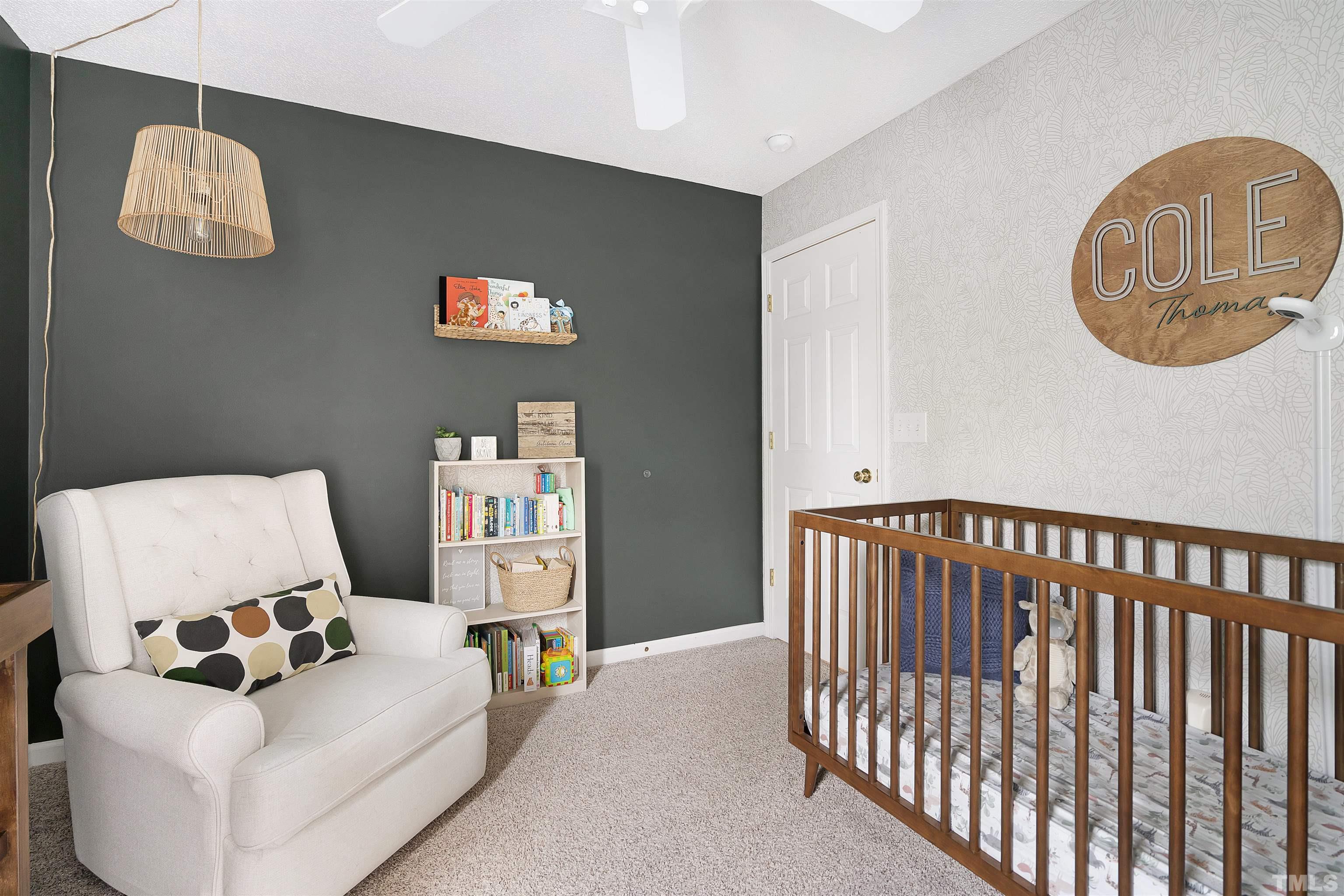 12440 North Exeter Way Durham, NC 27703 - Photo 30 of 36 a living room with furniture and a window