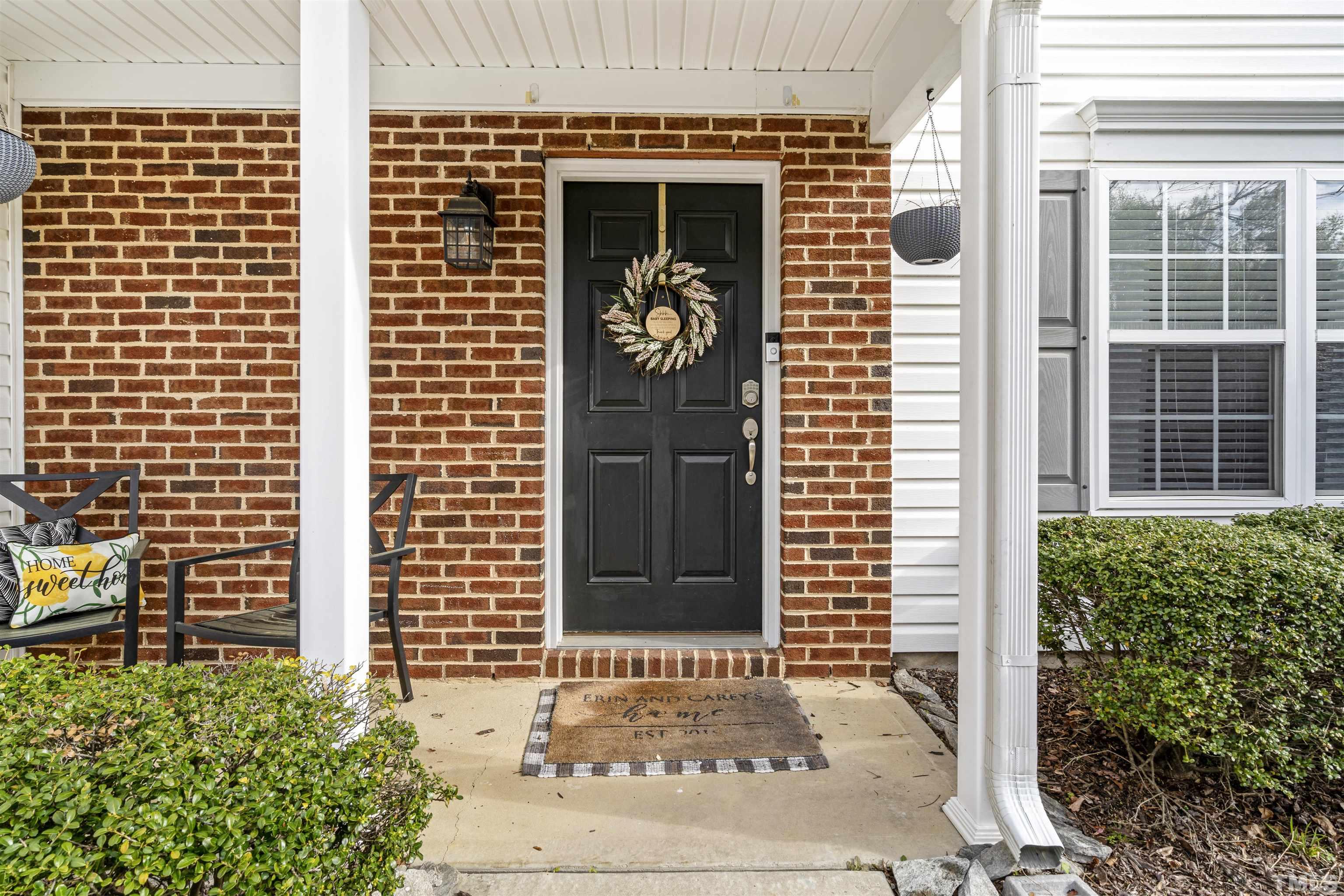 12440 North Exeter Way Durham, NC 27703 - Photo 4 of 36 a front view of a house