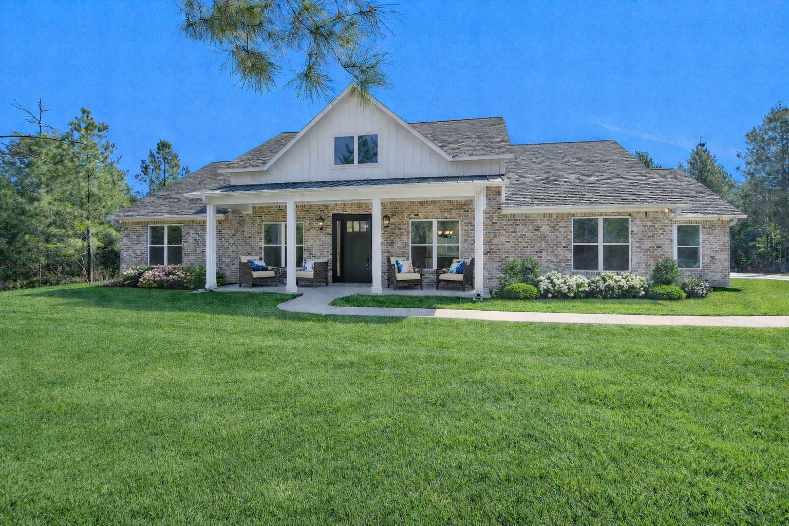 12744 Oak Barrel Road Willis, TX 77378 - Photo 3 of 50 Landscaping shown in photos has been virtually enhanced for inspiration purposes. The yard is currently a blank canvas, offering the perfect opportunity for a buyer to design and customize their own outdoor space to match their vision and style.