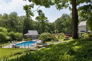 14 Lower Shad Road Pound Ridge, NY 10576 - Photo 1 of 1 a table and chairs in a garden
