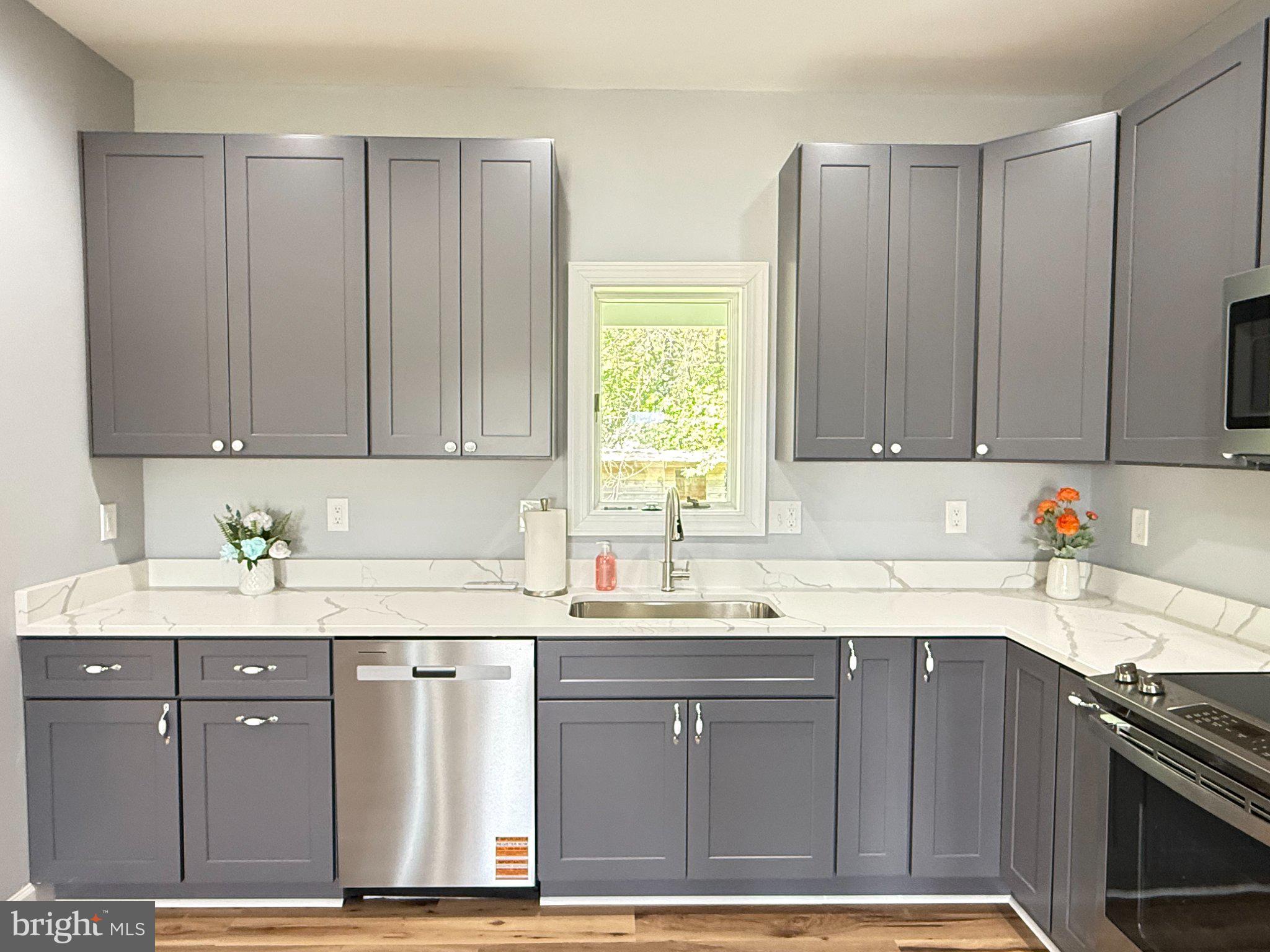 6416 Edesville Road Rock Hall, MD 21661 - Photo 13 of 43 Modern kitchen with sleek cabinetry.