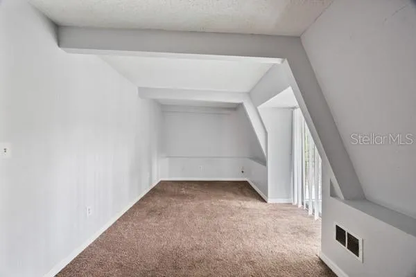 a picture of a bathroom with a shower