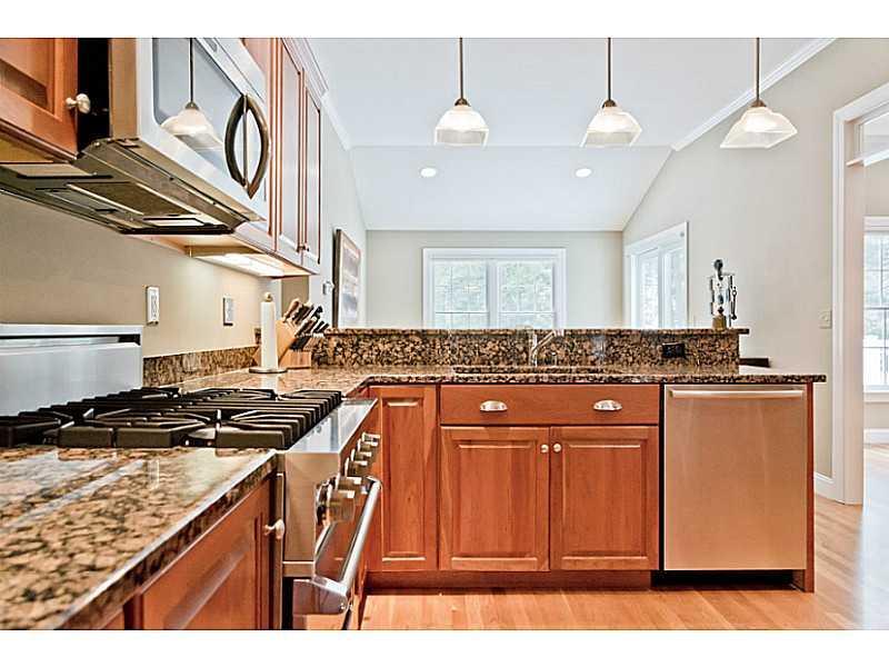 2 Granite Ridge Road, Unit 2 Cumberland Foreside, ME 04110 - Photo 6 of 28 Kitchen. The updated kitchen is a...