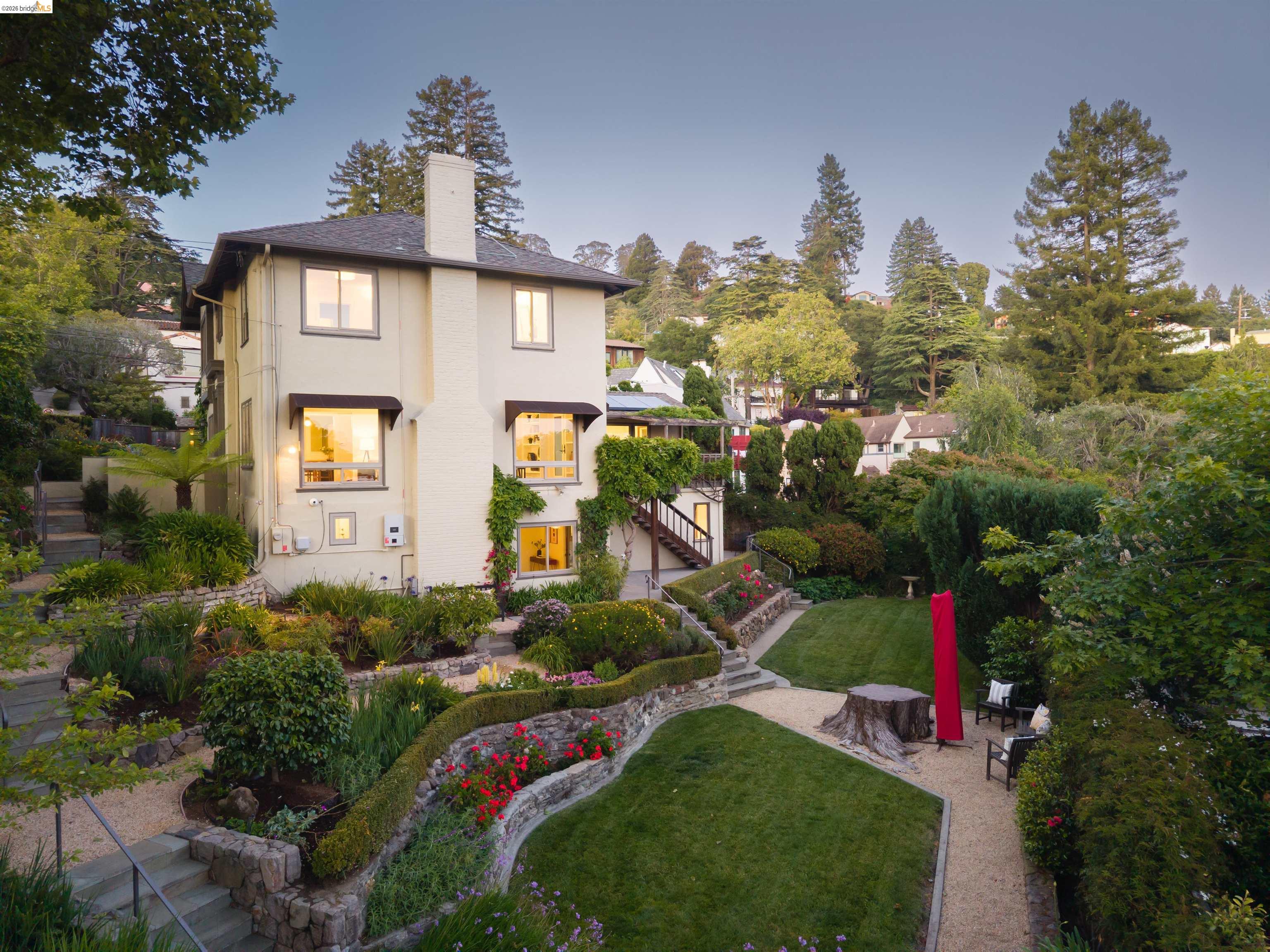 900 Euclid Avenue Berkeley, CA 94708 - Photo 49 of 54 a front view of a house with a yard and outdoor seating