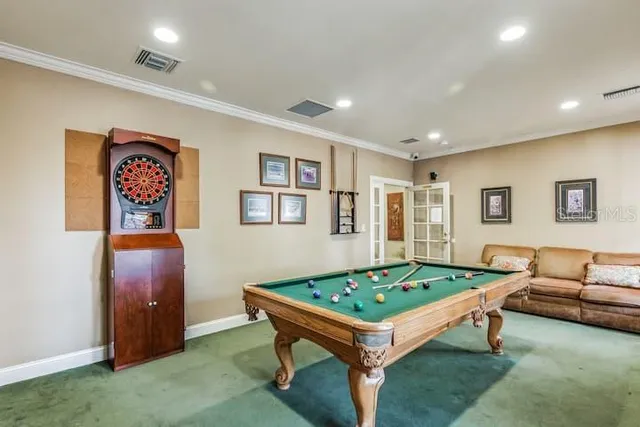 a living room with furniture and a table