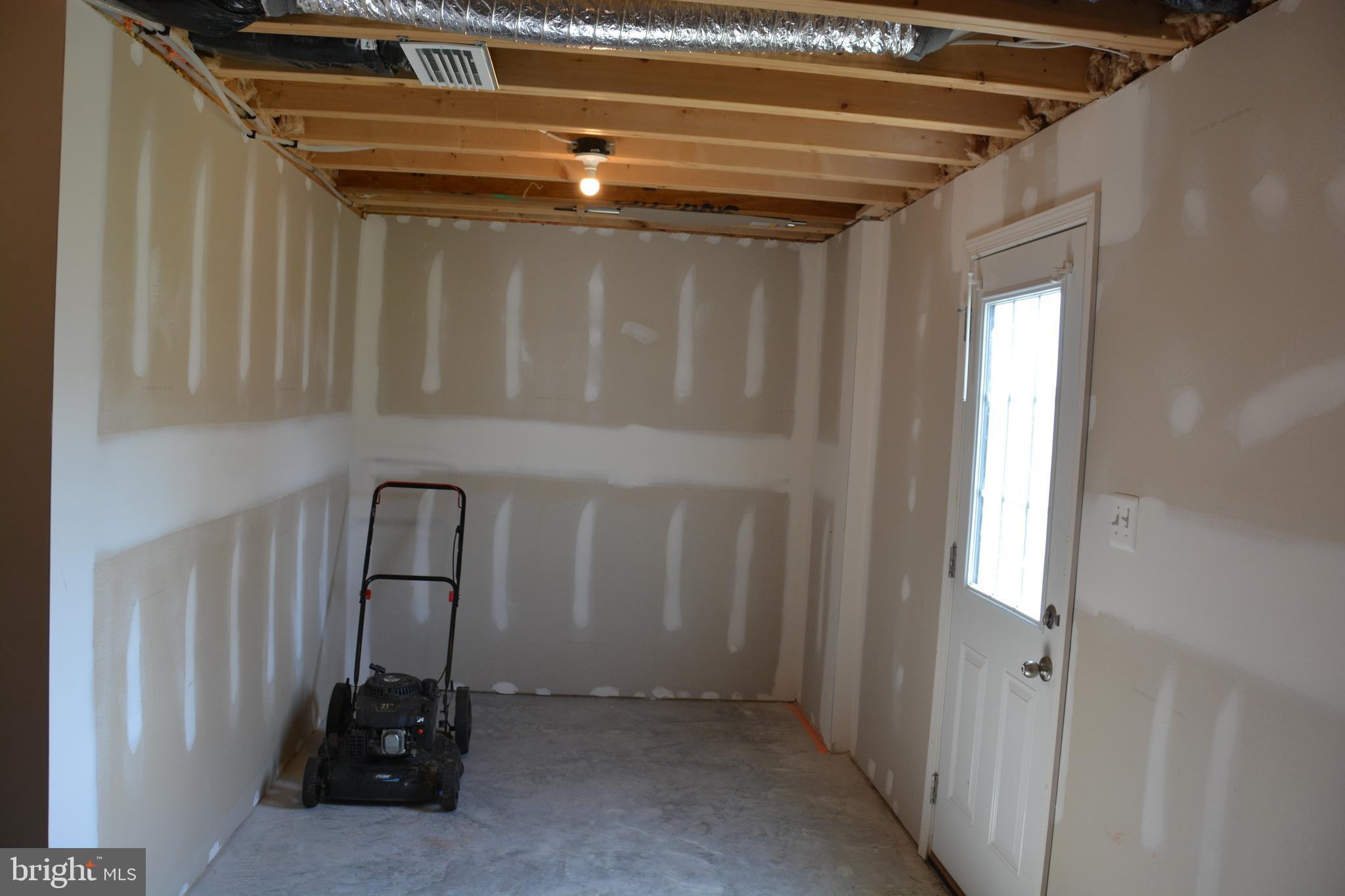 14 Tadpole Landing Road Inwood, WV 25428 - Photo 21 of 26 Storage space w/access to rear yard