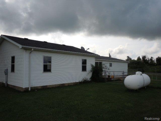 671 North Youngs Road Attica, MI 48412 - Photo 2 of 3 rear