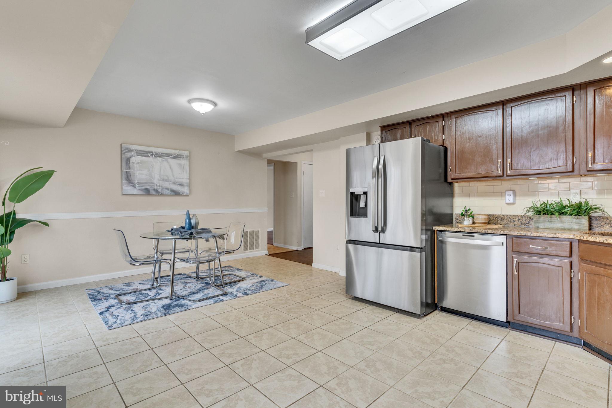 9216 Spring Acres Road Clinton, MD 20735 - Photo 19 of 36 Tile flooring makes it easy to maintain