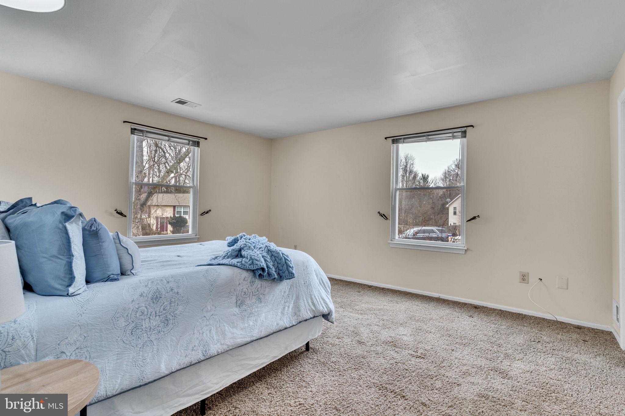 9216 Spring Acres Road Clinton, MD 20735 - Photo 5 of 36 Primary suite on the main level