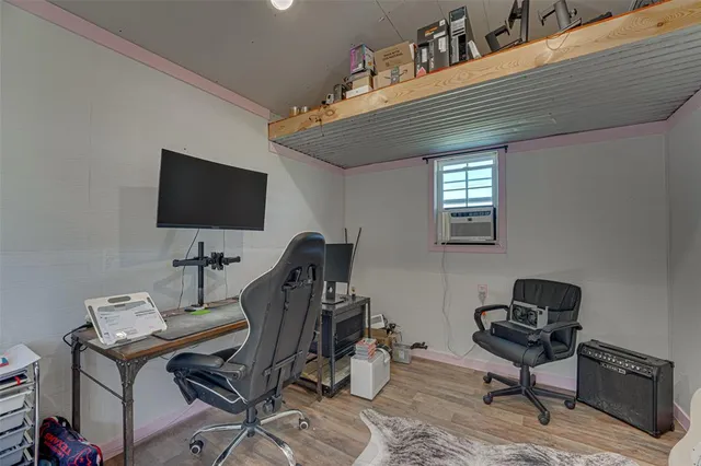 swimming pool view with a seating space