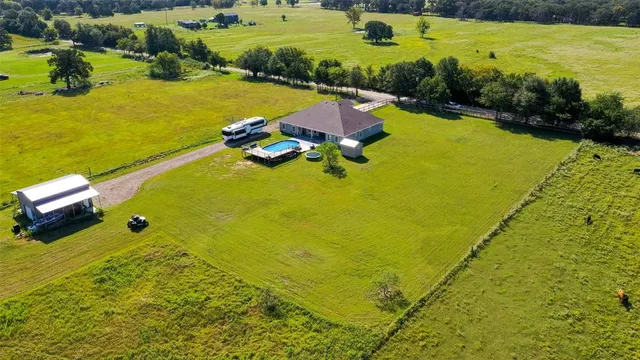 a house with yard in front of it