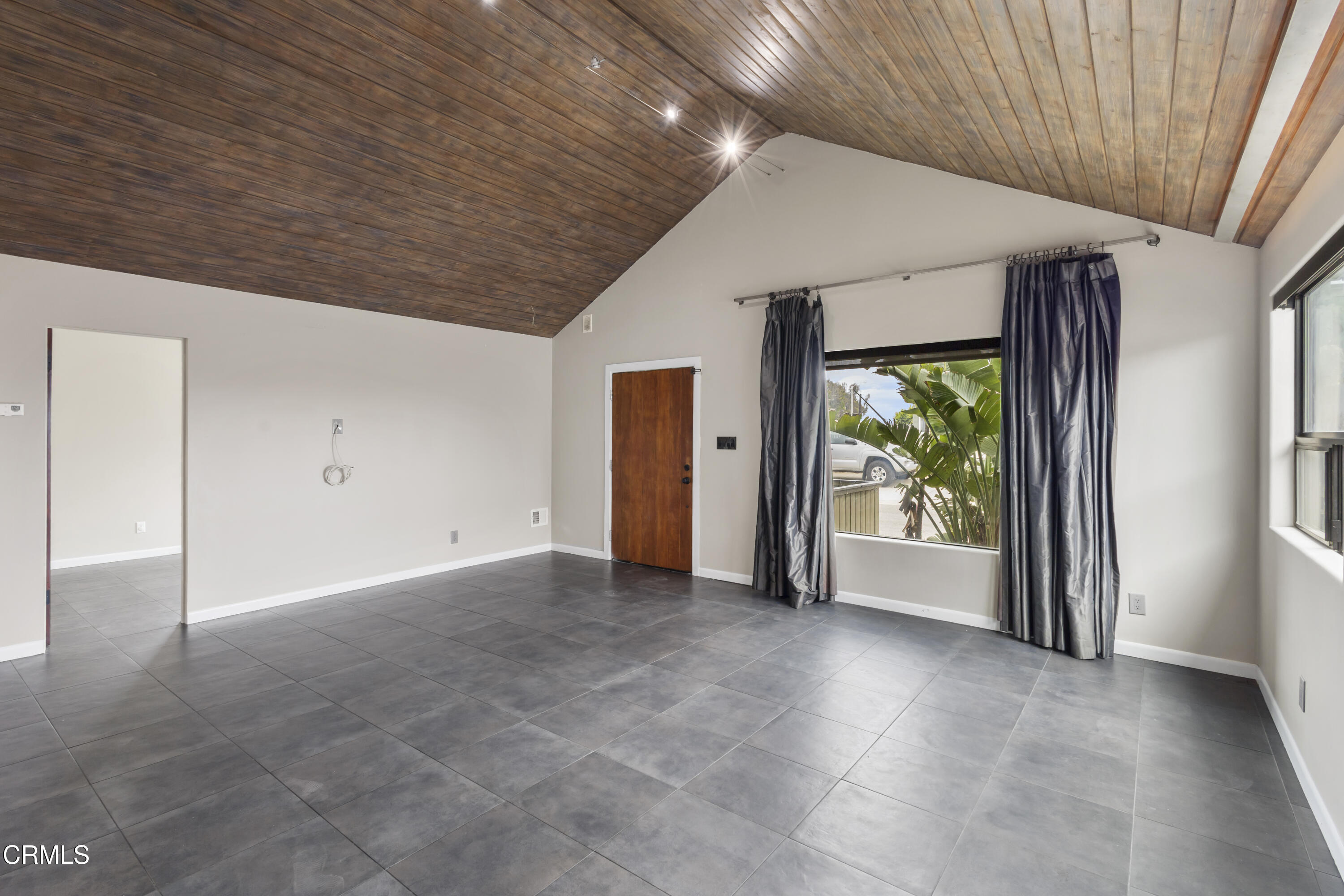 153 San Fernando Avenue Oxnard, CA 93035 - Photo 7 of 22 a view of an empty room with a window