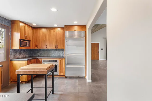 a room with furniture and a fireplace