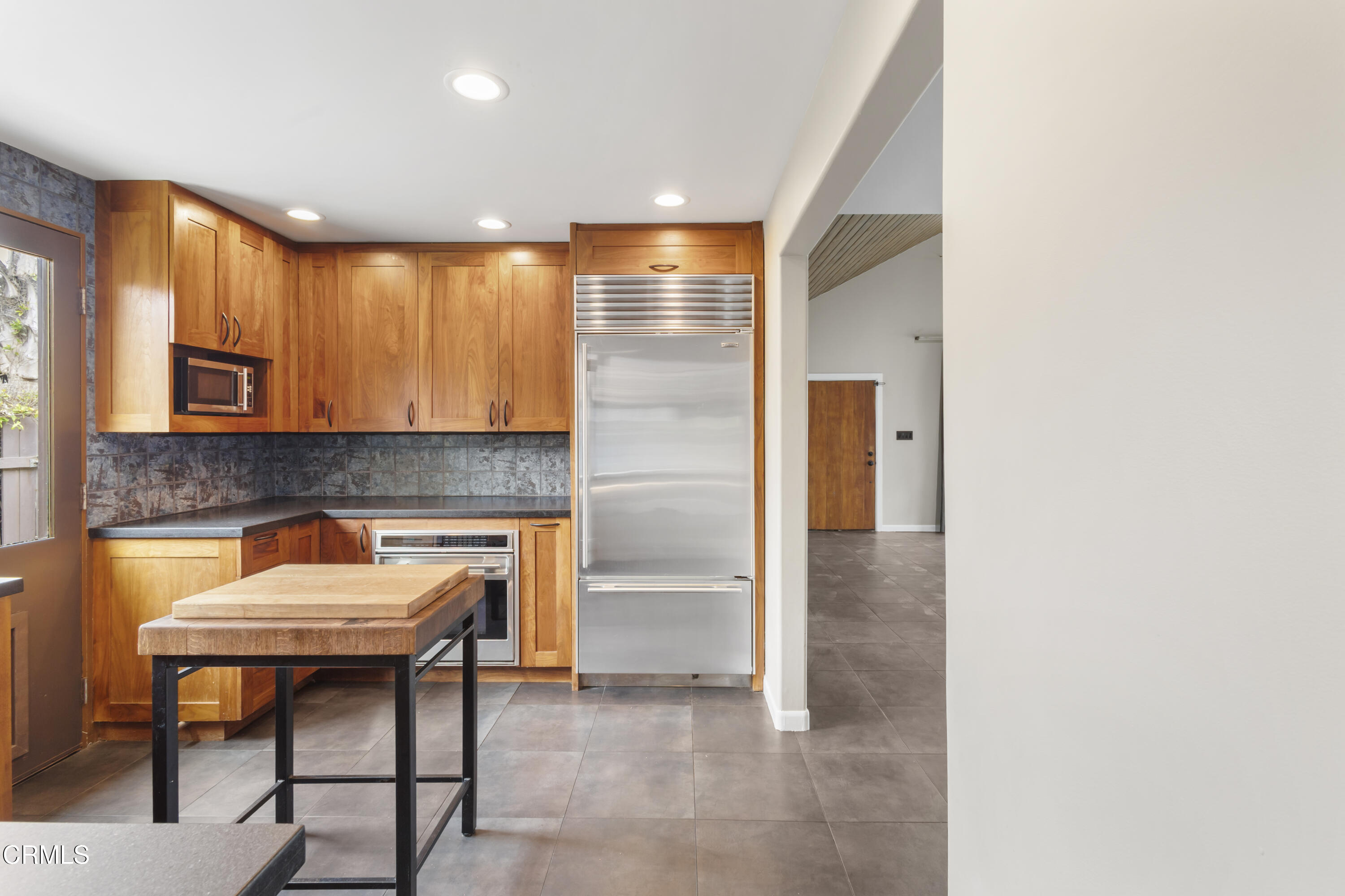 153 San Fernando Avenue Oxnard, CA 93035 - Photo 9 of 22 a room with furniture and a fireplace